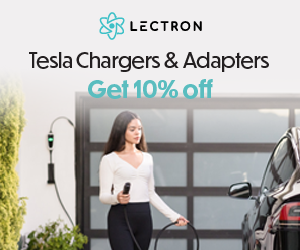 Woman charging a Tesla at home.